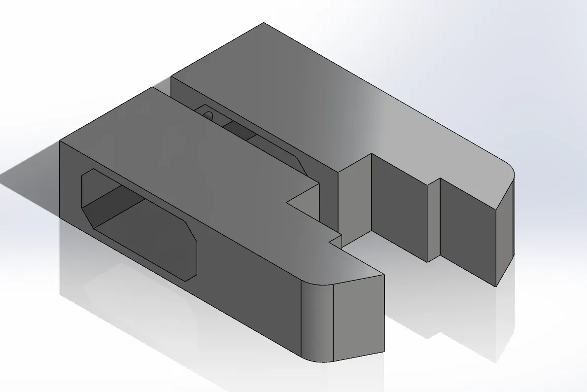CAD isometric render of the custom three-level pneumatic gripper jaw.
